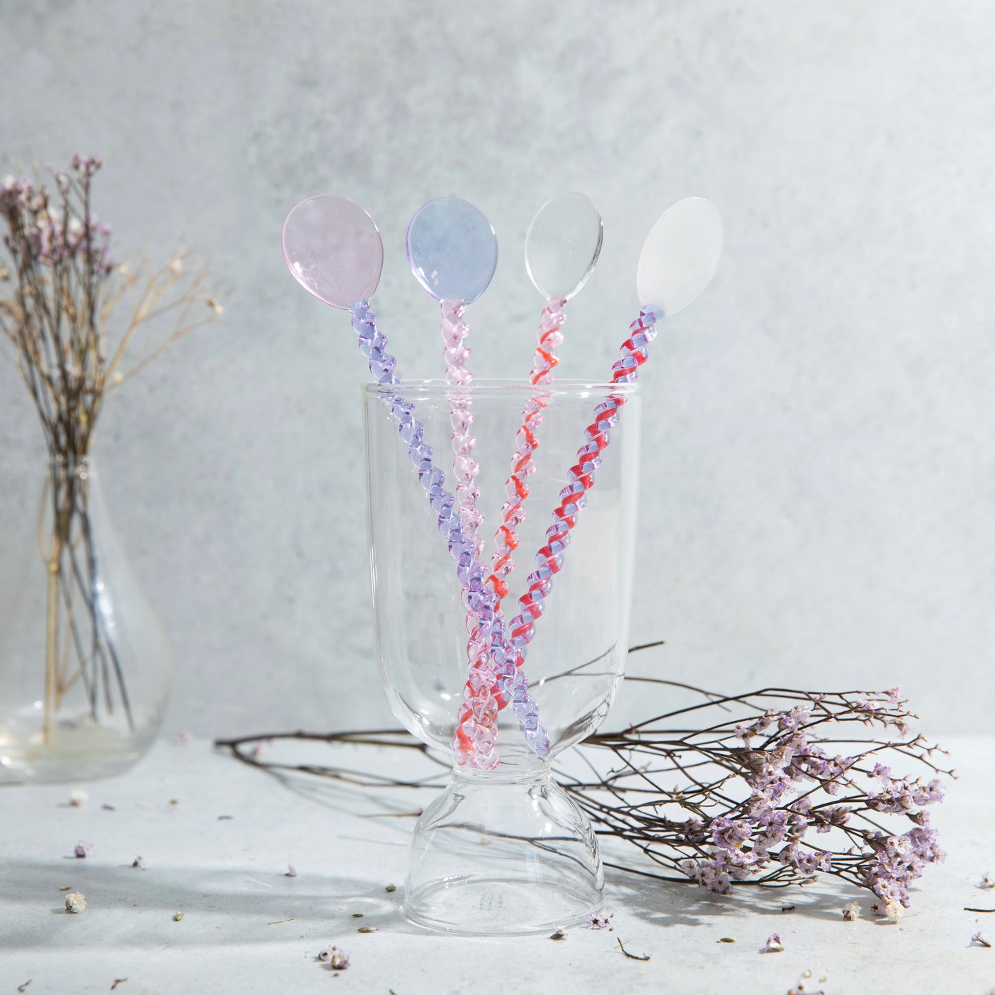 pink lilac stirring spoon glass