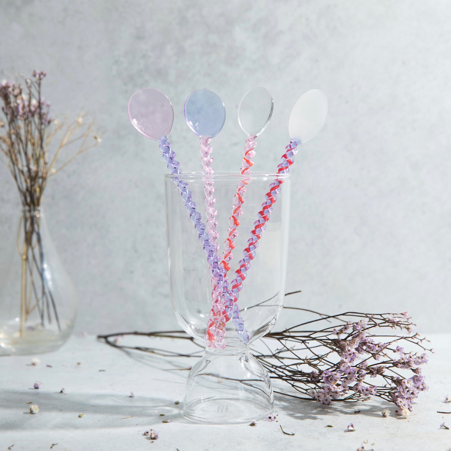 pink lilac stirring spoon glass